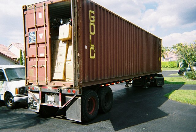Packing Service Inc loading 40 foot international container 